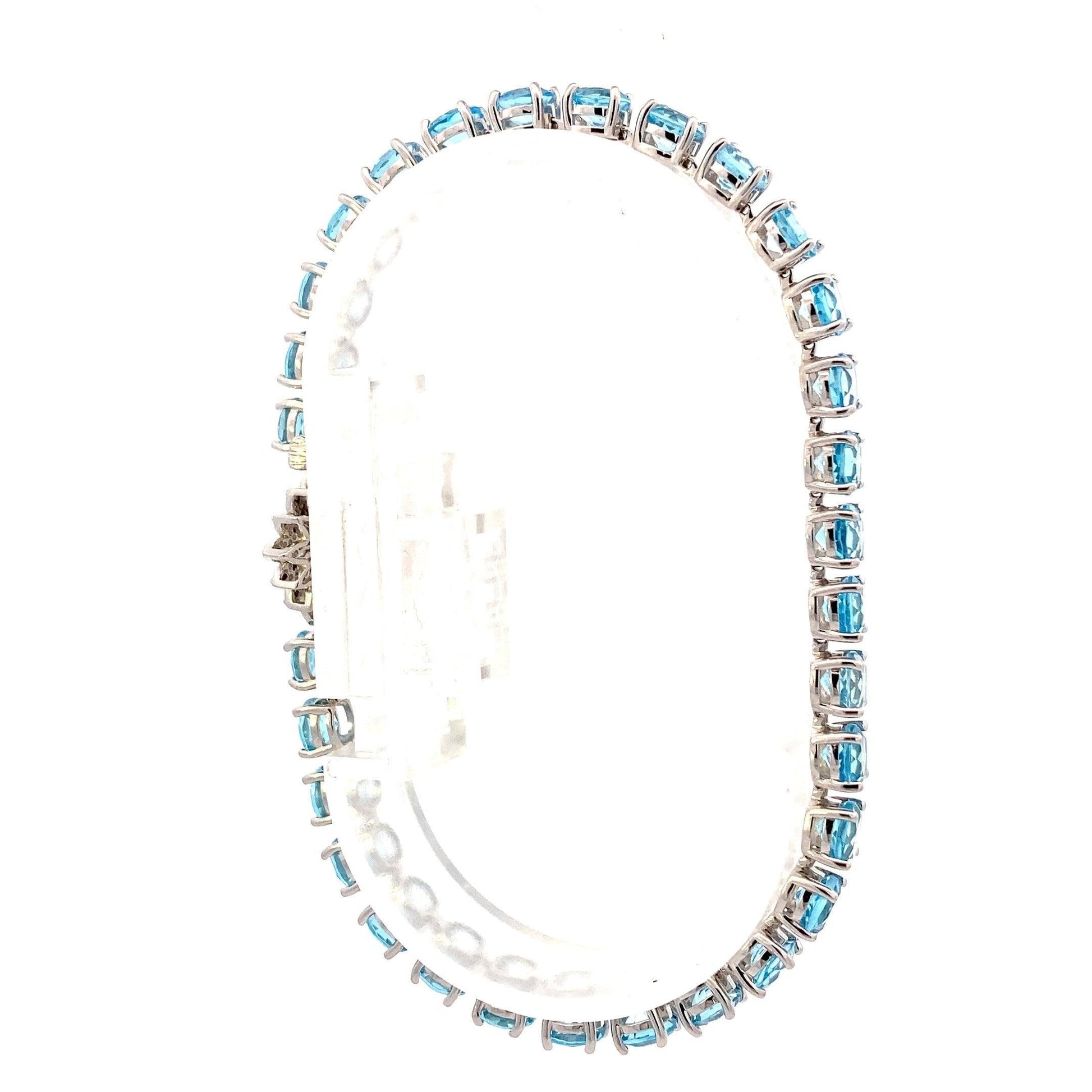 14K White Gold Blue Topaz Diamond Bracelet - 0.10ct - ipawnishop.com