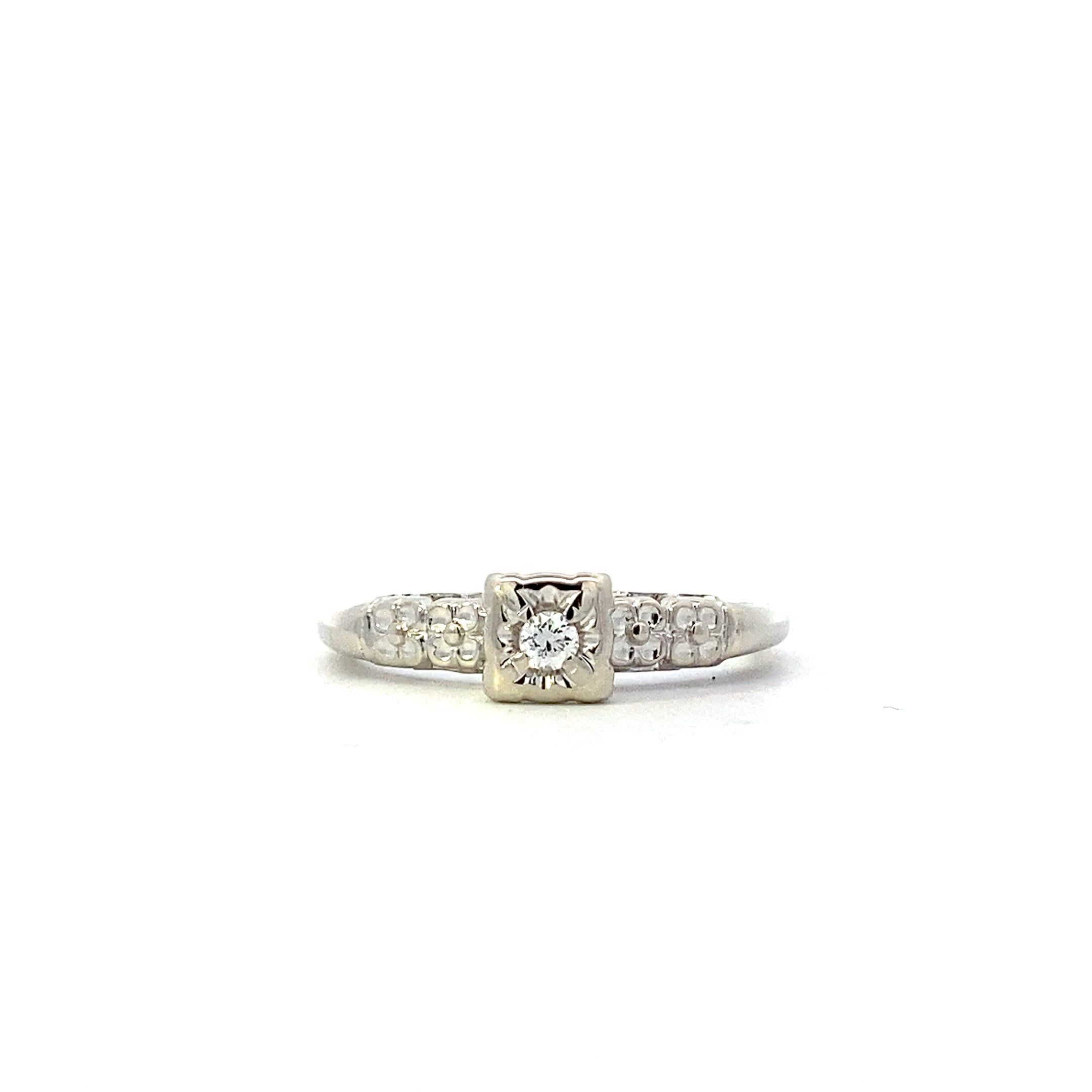 14K White Gold Diamond Solitaire Ring - 0.05ct
