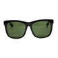 Black sunglasses with green lenses on a white background