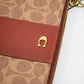 Coach Burnt Orange Wristlet - F2357