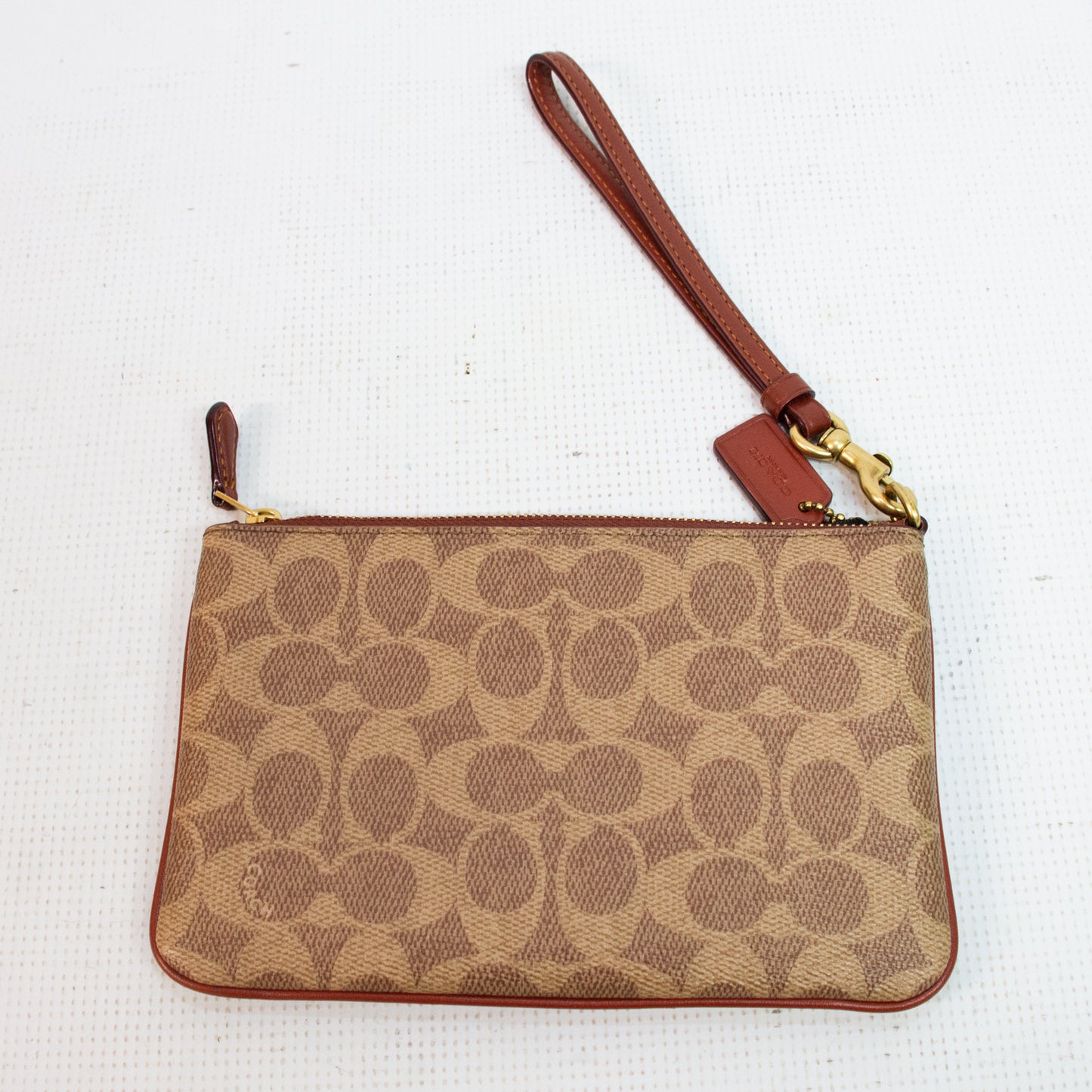 Coach Burnt Orange Wristlet - F2357