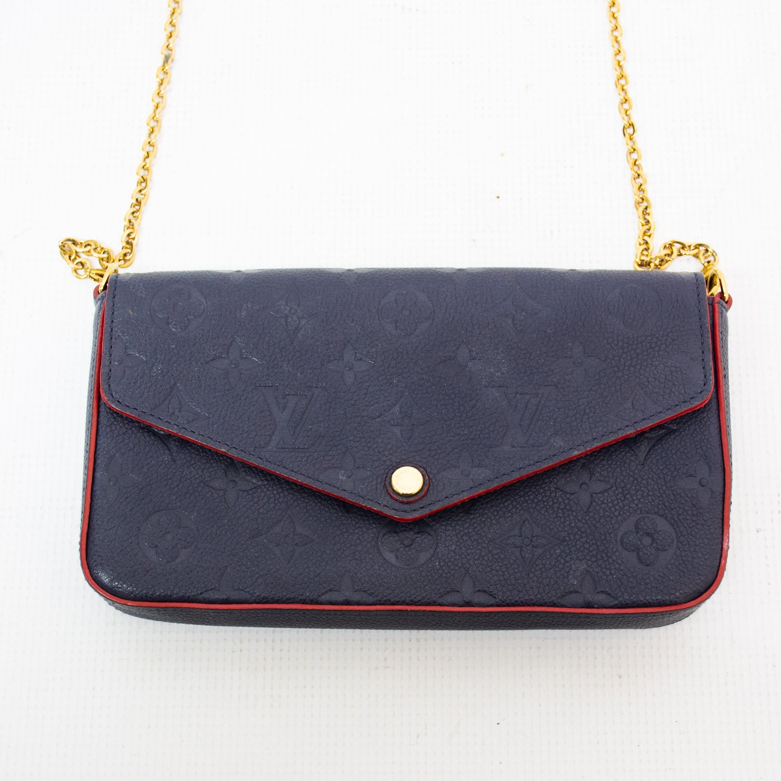 navy and red louis vuittons handbags