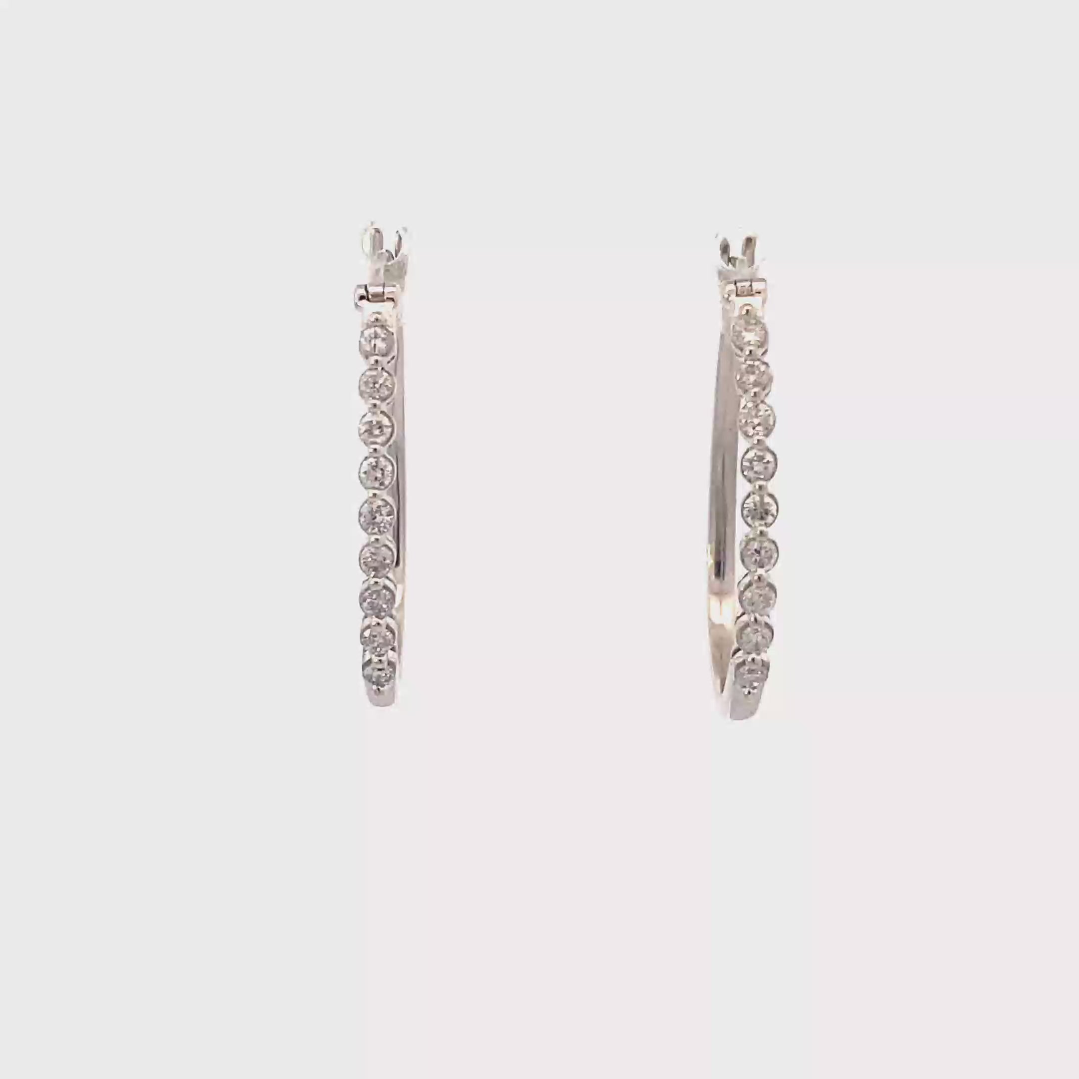 14K White Gold Diamond Oval Hoop Earrings - 0.18ct