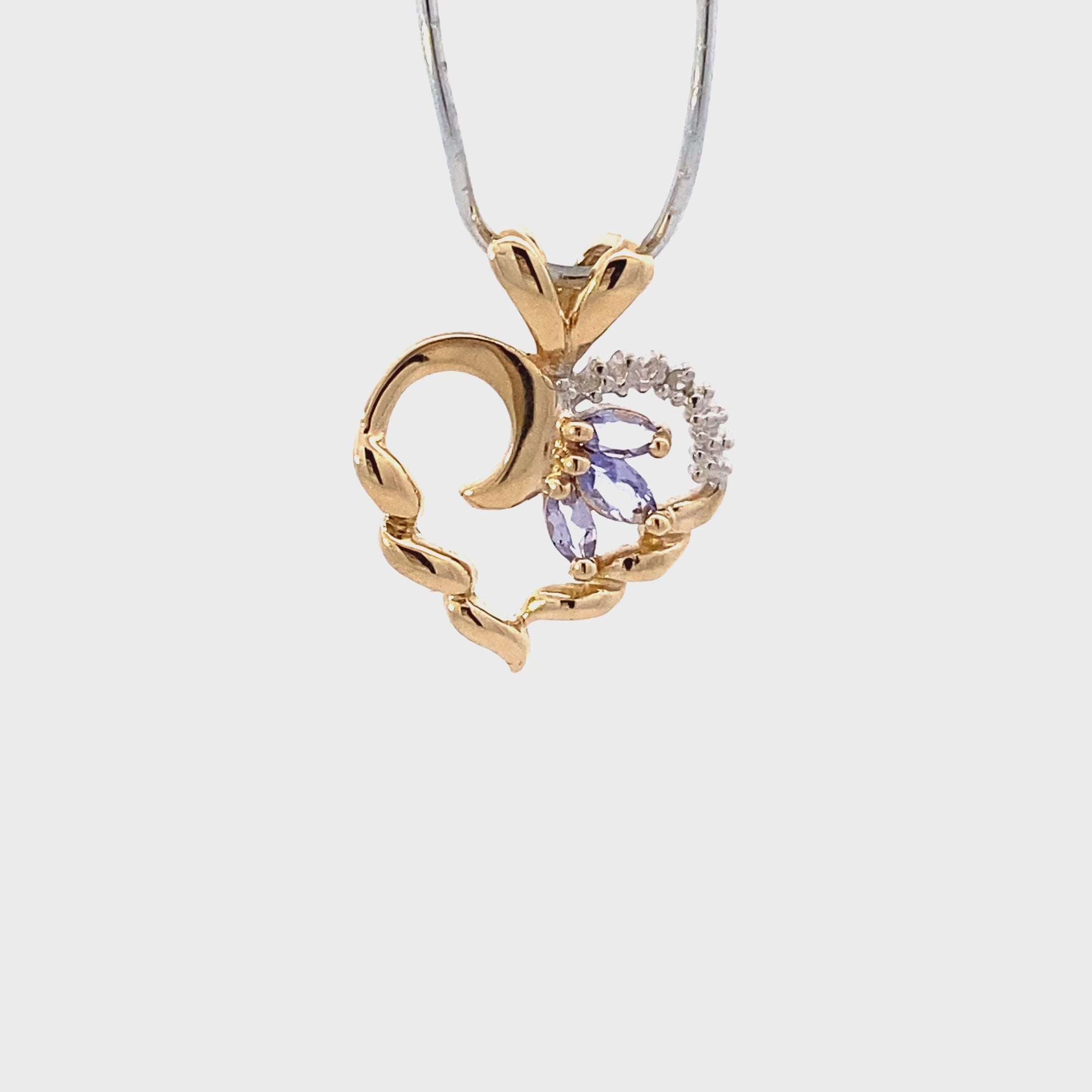 10K Yellow Gold Tanzanite & Diamond Heart Pendant - 0.006ct