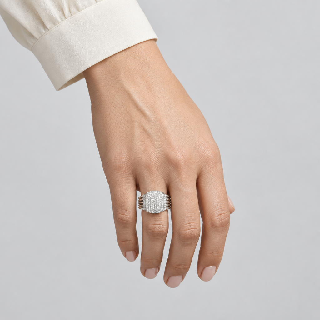 Ring on a female hand in the reference photo’s studio composition